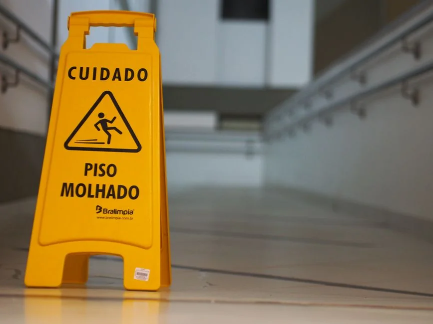 heros-img person-holding-yellow-plastic-spray-bottle-zmnefoi3k